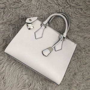 Small to medium sized handbag, brand new condition